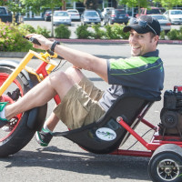 Crew member Andy Frezza takes the Lux Performance Big Wheel for a spin. (Photo: Jeff Boerio)