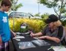 Cindi signs an autograph for a couple of young fans. (Photo: Jeff Boerio)
