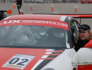 Cindi provides final instruction to Steve before the Lux Performance-prepped Porsche heads out.