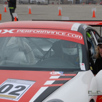 Cindi provides final instruction to Steve before the Lux Performance-prepped Porsche heads out.