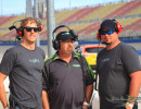 Crew Chief Fred Lux and two crew members wait for the car to come in.