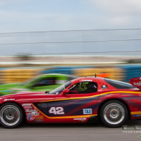 Steve and a car from another class during the Trans Am race.  (Photo: Jeff Boerio)