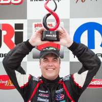 Steve Streimer brings home the first place trophy for Lux Performance.  (Photo: Jeff Boerio)
