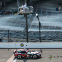 Cindi takes the checkered flag at Indianapolis. (Photo: Jeff Boerio)