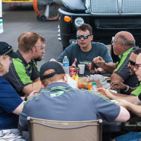 The Lux Performance Team sits down for a meal at IMS (Photo: Jeff Boerio)