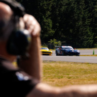 Fred watches Cindi on track.