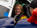 Cindi talks with her crew before the race. 