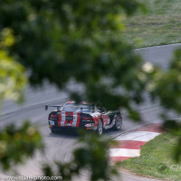 Seeing the forest through the trees, Cindi set the fastest race lap of the class, and set a track record. (Photo: Chris Clark)