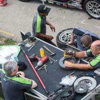Quick brake change between sessions.  (Photo: Jeff Boerio)