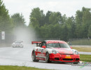 Steve leads into turn 10 during the Rose Cup Race, with Cindi running second. (Photo: Jeff Boerio)