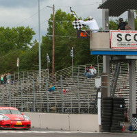 Steve takes the checkered flag and wins at the Rose Cup.  (Photo: Jeff Boerio)