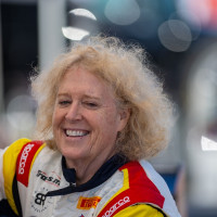 Cindi gets into the car.