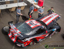 The Lux Performance crew makes some changes to the car between test sessions. (Photo: Jeff Boerio)