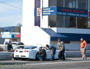 The Lux Performance crew takes readings on tires during a test session.