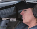 Cindi gets comfortable in her new racecar.