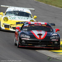 Cindi battled closely with the Porsche for much of the race at VIR.  (Photo: Chris Clark)